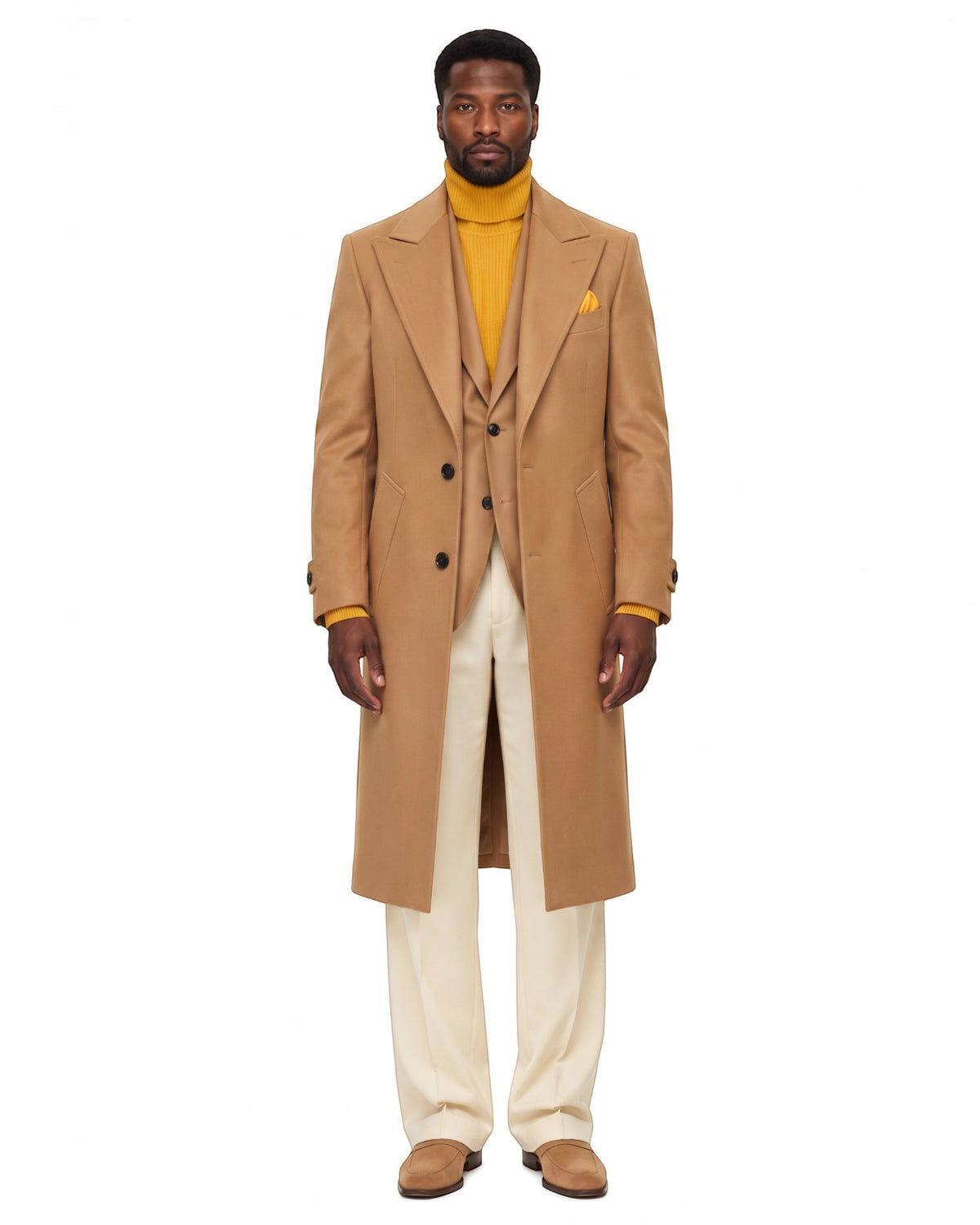 Terry Corbett New York camel wool-blend overcoat with peak lapels and three-button closure worn by a male model.