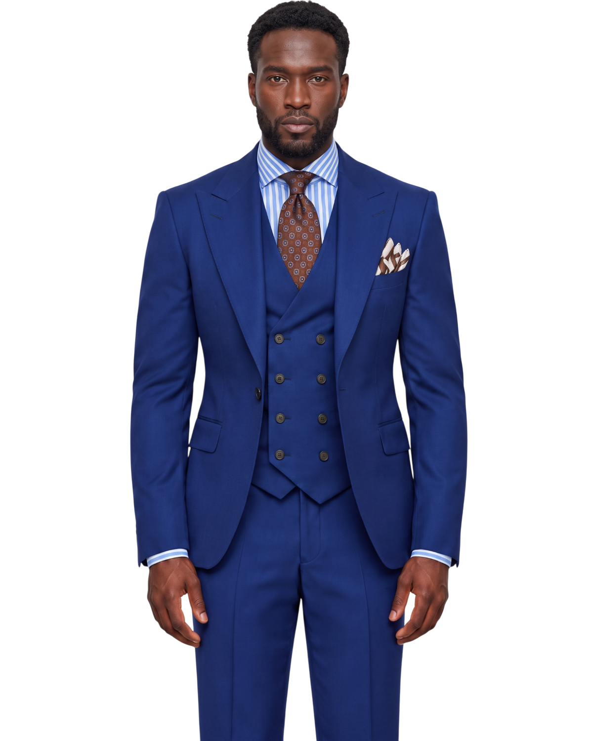 A man modeling a royal blue three-piece suit with a matching vest and trousers, a light blue striped dress shirt, a brown patterned tie, and a matching pocket square, set against a plain white background.