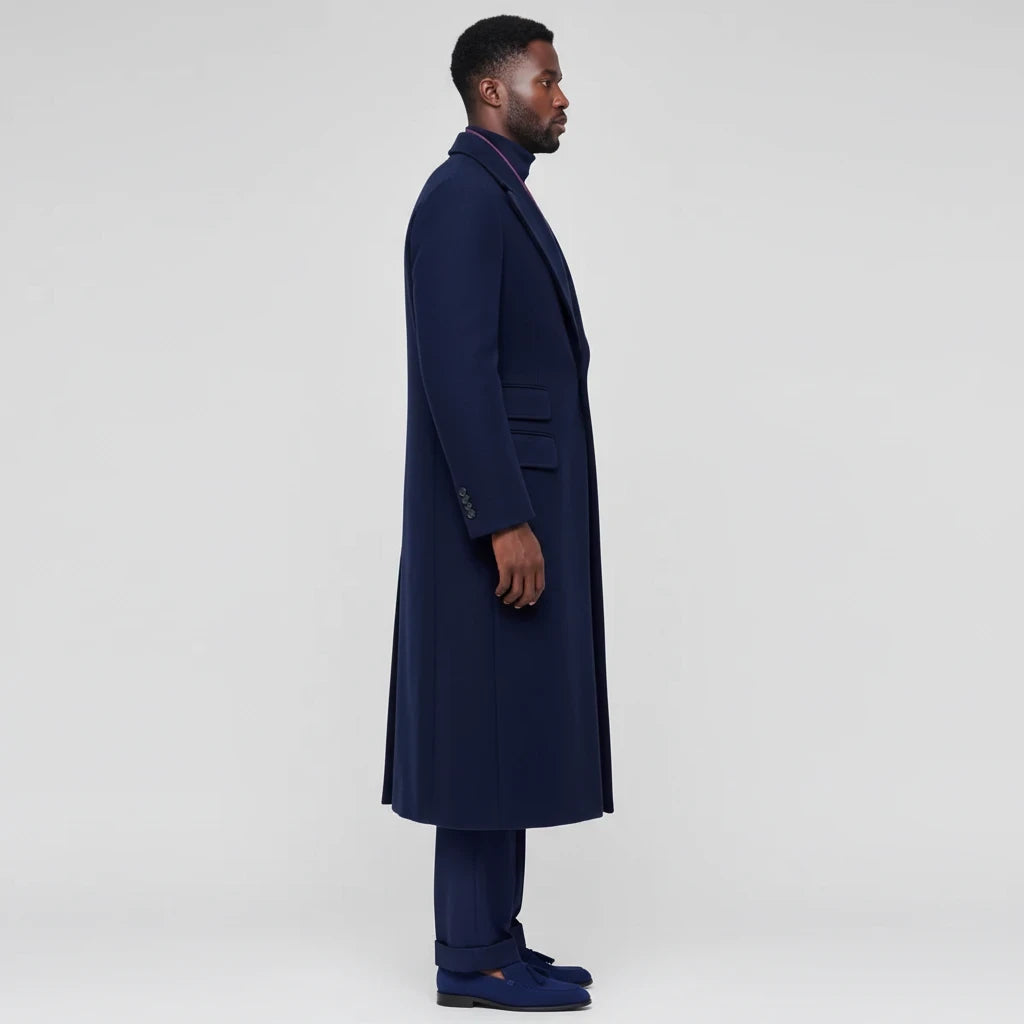 Terry Corbett New York navy blue wool-blend longline overcoat worn by a man in profile view