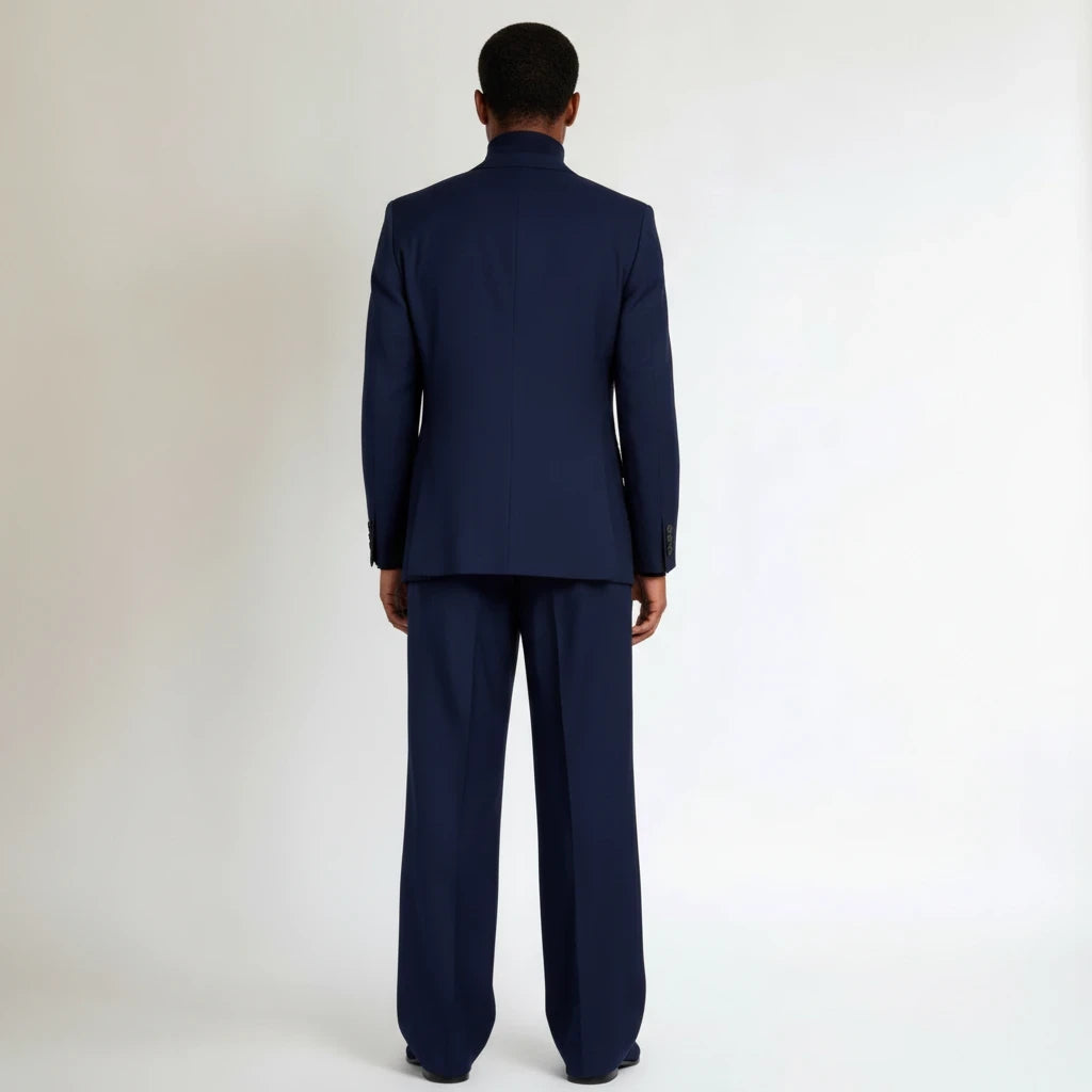 Back view of a man wearing a Terry Corbett New York navy blue wool blend tailored two-piece suit with wide-leg trousers