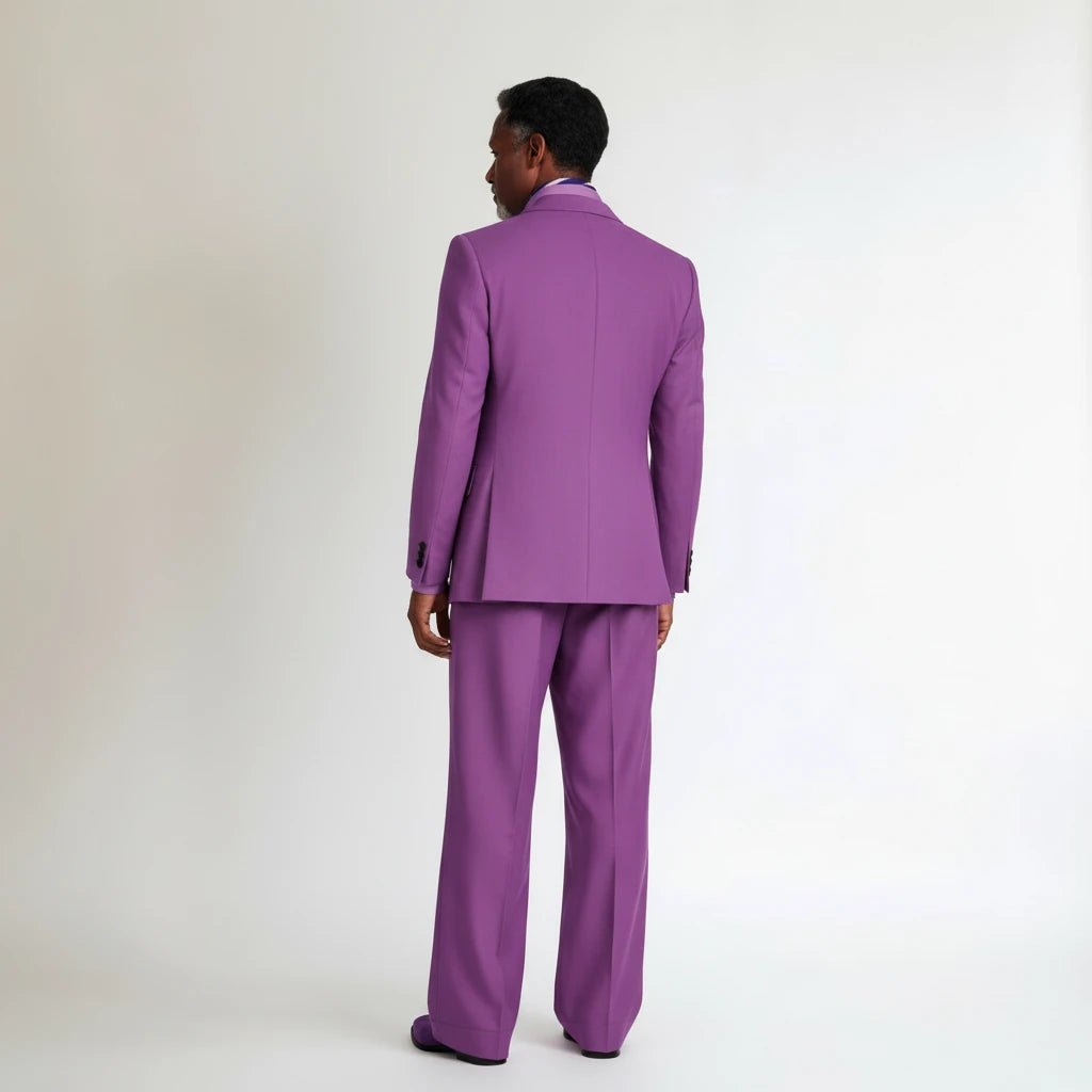Back view of a man wearing a vibrant violet Terry Corbett New York three-piece tailored suit with a structured jacket.