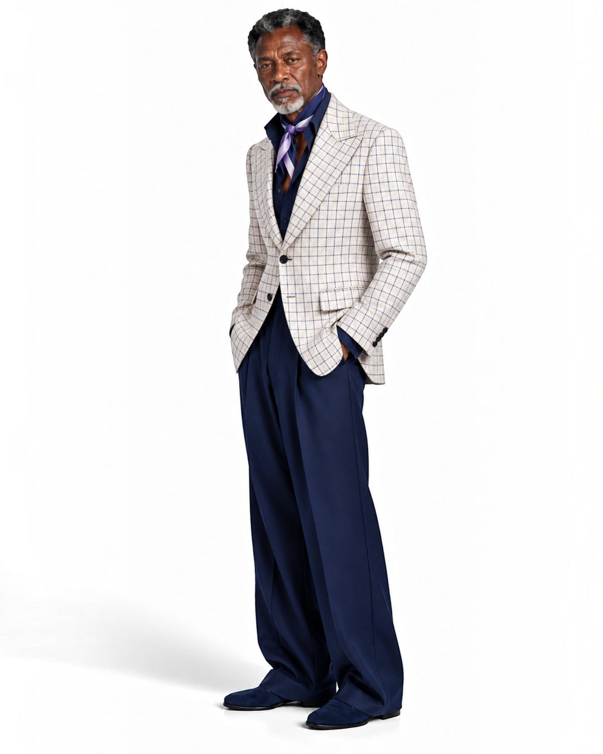 Terry Corbett New York tailored blazer in cream with a navy windowpane check pattern worn by a man with a silk scarf.